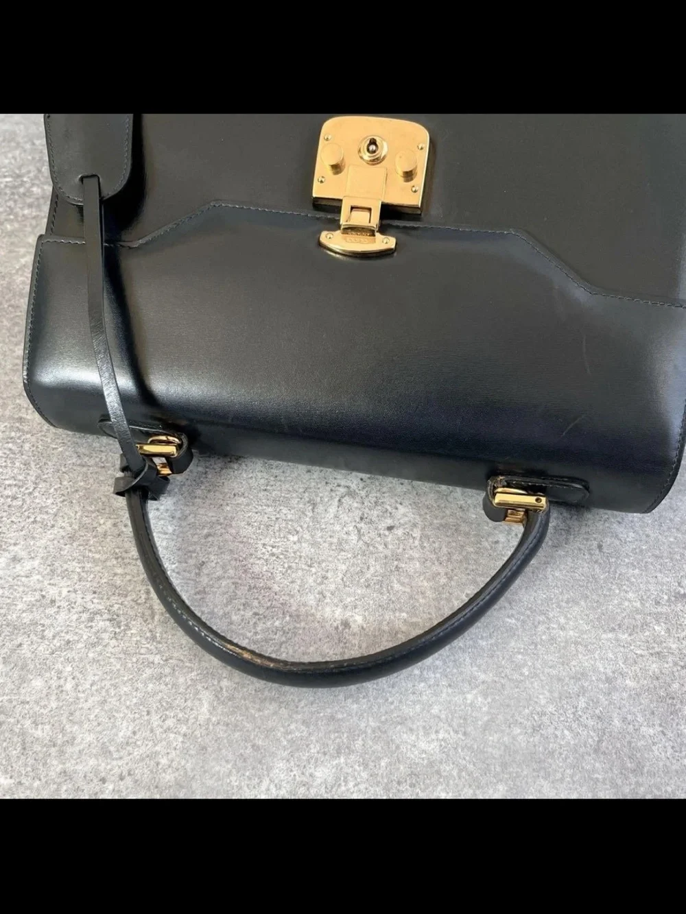 Gucci Black Leather Top-Handle Satchel with Gold Hardware Accent